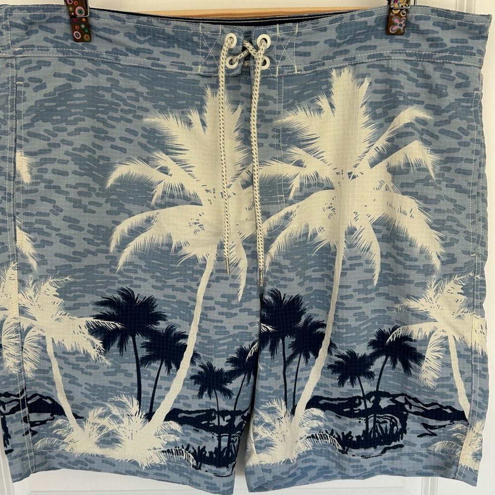 Tommy Bahama Blue and White Board Shorts with Tropical Print